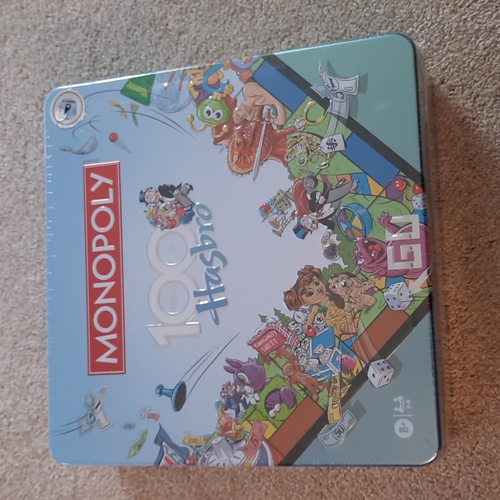 UNOPENED.  Monopoly 100 Years Hasbro Special Edition Board Game in Tin Box